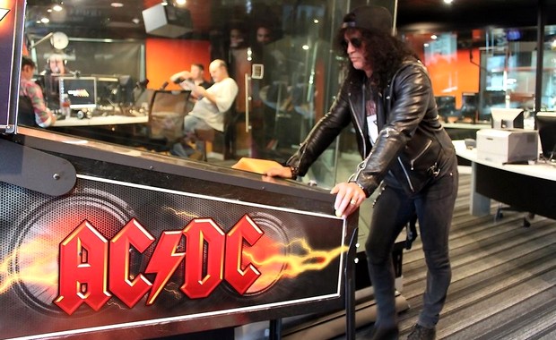 Slash playing pinball Slash playing pinball
