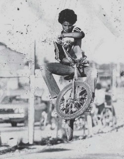 Slash riding his BMX in 1978